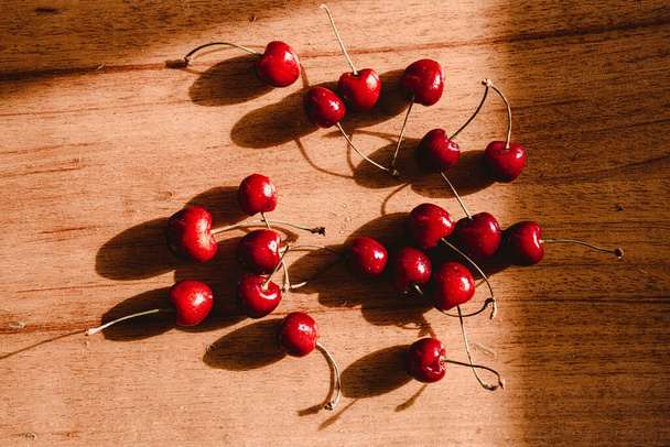 Delicious cherry on a hot sunny day - Fotoğraf, Görsel