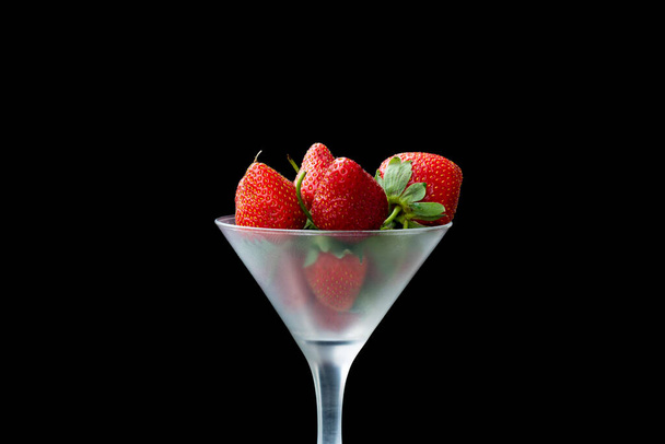 fresh strawberries on a black background. Close-up shot. Macro - Foto, Imagem