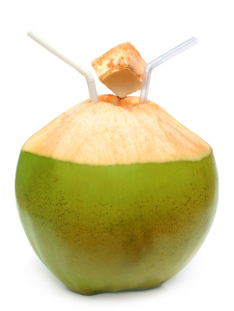 Green coconut with pipes - Photo, Image