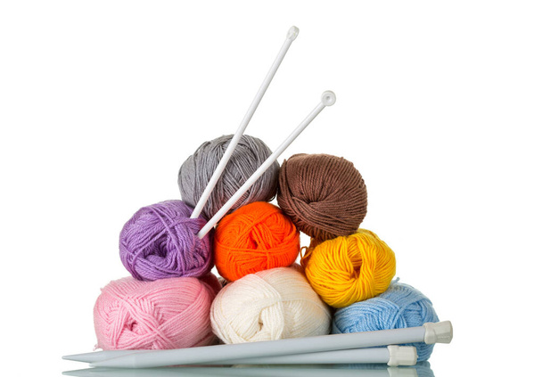 Multi-colored skeins of wool yarn for knitting. Close-up isolated on a white background. - Foto, immagini