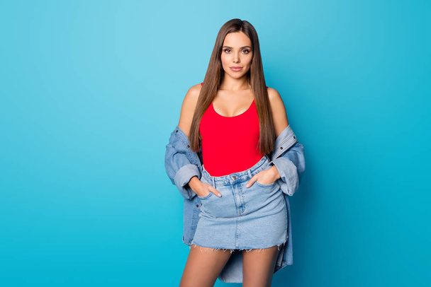 Portrait of sweet lovely nice girl want attract millionaire guy put hands pockets wear stylish trend outfit isolated over blue color background - Foto, Imagem