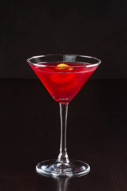 glass with alcohol cocktail on black background - Foto, Imagem