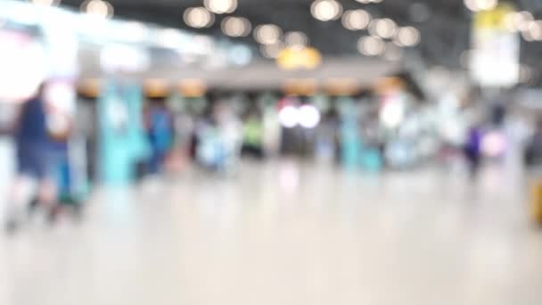 Blur of passengers are walking at airport in dutyfee - Footage, Video