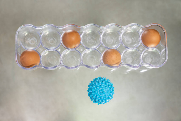 NEW NORMAL. New normal concept. Word with eggs in a box. Virus picture, Germs. COVID-19.  - Photo, Image