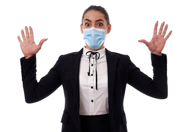Terrified businesswoman with face mask against white background - Zdjęcie, obraz