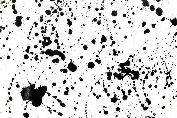 Background splash black on paper. Creative abstract art from ink and watercolor. - Photo, Image