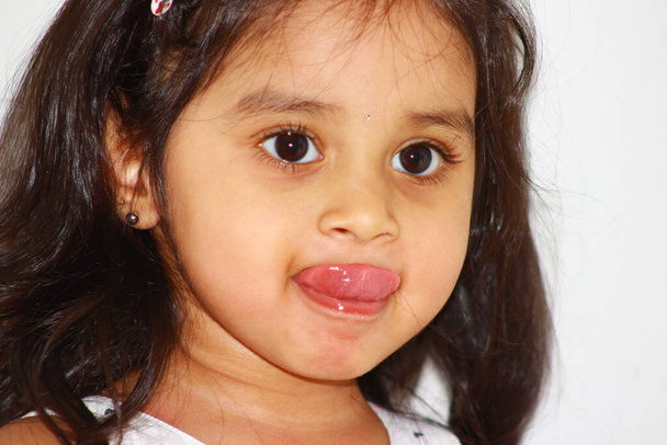 closeup of multiple cute expressions and emotions of a toddler girl - Photo, Image