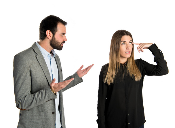 Empresária fazendo um gesto louco sobre fundo branco
 - Foto, Imagem