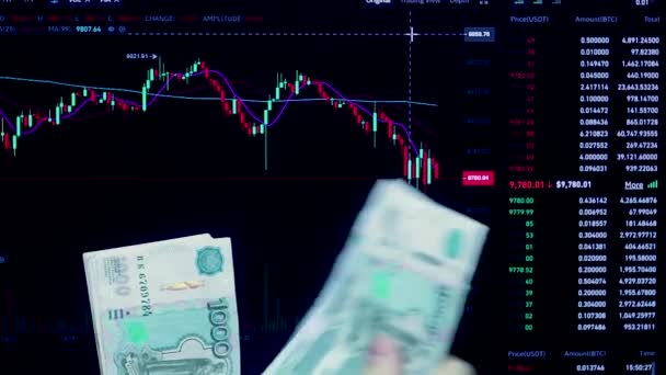 Count money in Russian rubles.The price of money on the chart exchange, work on the currency market and Forex.Price analysis.Lot with Russian ruble in hand before the trading price chart. - Footage, Video