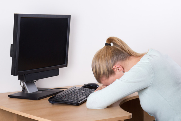 stressed woman with personal computer at work - Photo, Image