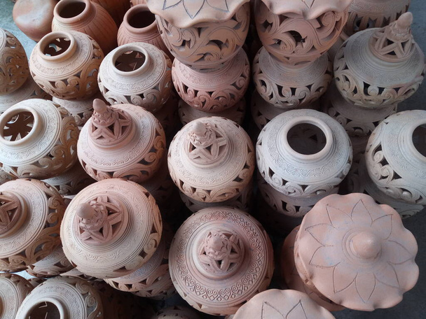 open air workshop of ceramics, earthenware, orange and brown terracotta flower pots craftmanship in Thailand - Photo, Image