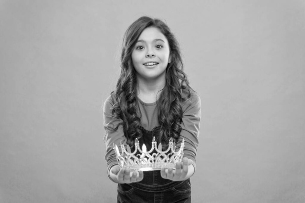 this is for you. luxury and success. find your motivation. small girl in queen crown. feel like big boss. being an egoist. reward for real champion. little princess. selfish kid long curly hair - Photo, Image