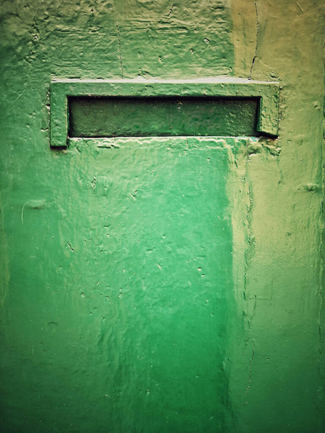 An old classic postal box on a wall. - Photo, image