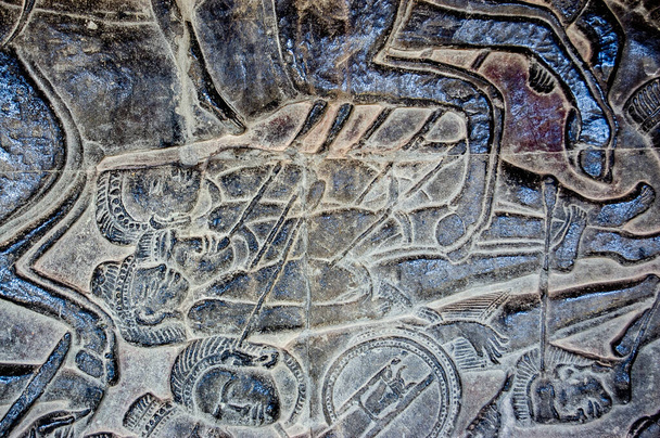 Askerlerin cesetleri okla gösteriliyor. Mahabharata 'da tarif edildiği gibi Kurukshetra Savaşı. 11. yüzyıl Angkor Wat Tapınağı, Siem Reap, Kamboçya. - Fotoğraf, Görsel