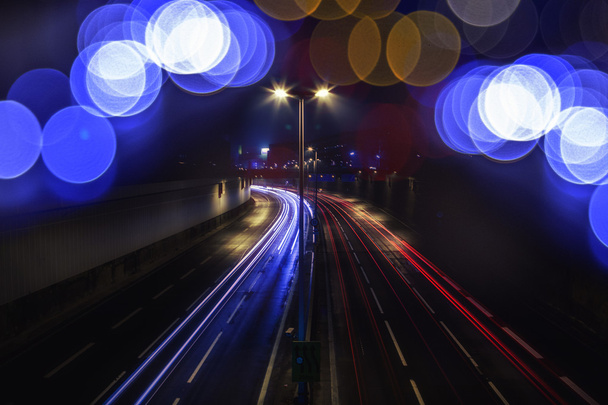 Nézd meg fény nyom egy forgalmas autópályán - Fotó, kép