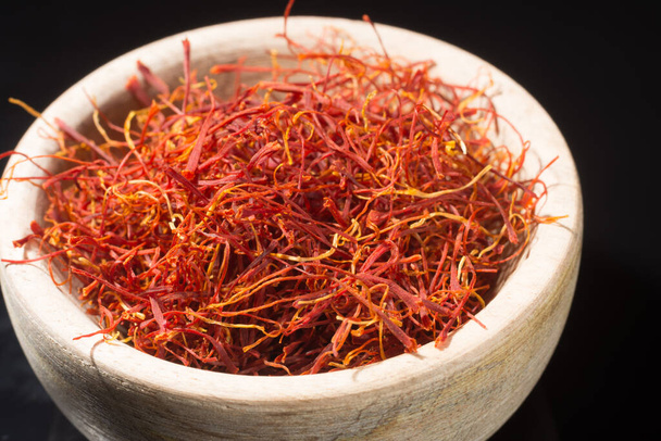 Macro collection, expensive real dried saffron spice close up on black background - Photo, Image