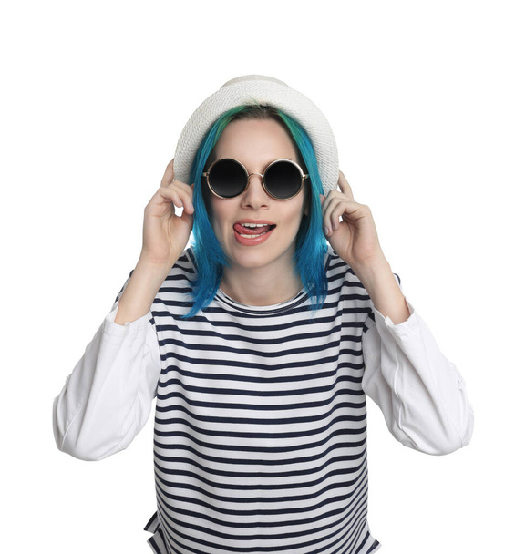 Young woman with bright dyed hair on white background - Photo, Image