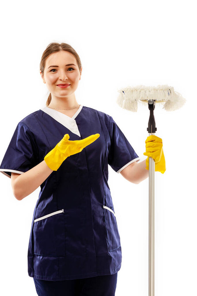 Cleaning woman pointing and showing your product or text isolated on white background. - Foto, immagini