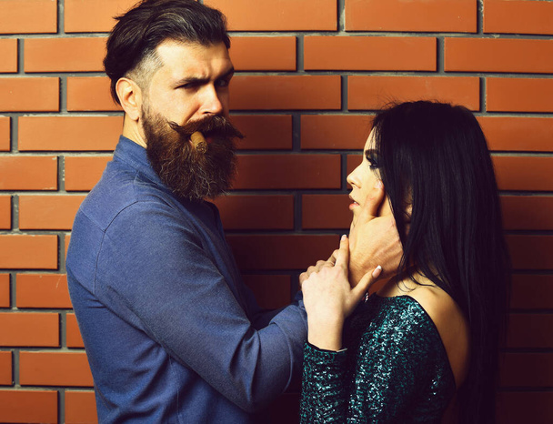 bearded man and pretty sexy woman with cigar - Fotoğraf, Görsel