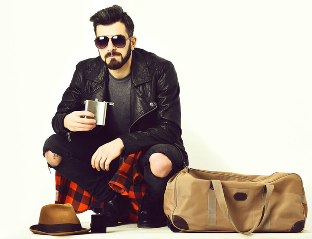 Bearded man, caucasian hipster with moustache holding flask - Photo, Image