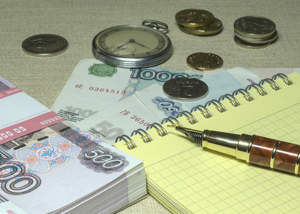 Деньги, ручка и часы
 - Фото, изображение