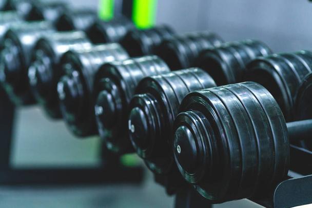 The set of the black dumbbells in the gym - Photo, Image
