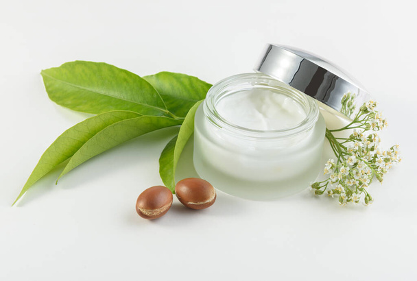jar of cream for skincare with argan nuts - Photo, Image