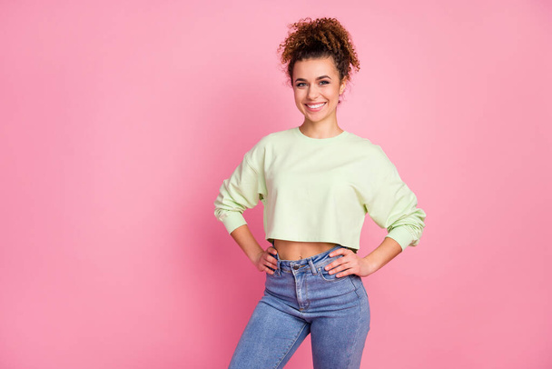 Portrait of her she nice-looking attractive lovely pretty charming content slim cheerful cherry girl wearing green crop top posing isolated over pink pastel color background - Foto, Imagen