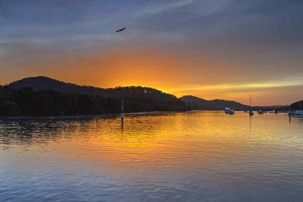 Sunrise waterscape on the bay. Woy Woy Waterfront on the Central Coast, NSW, Australia. - Zdjęcie, obraz
