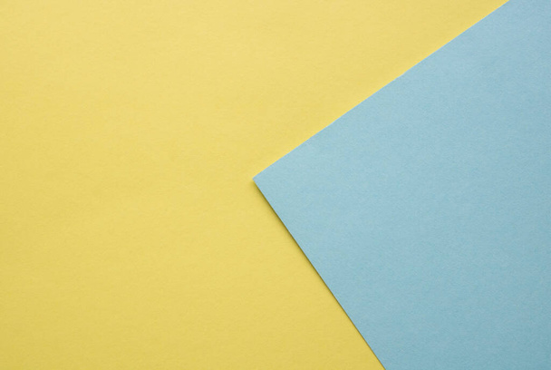 blue and yellow pastel paper color for background. - 写真・画像