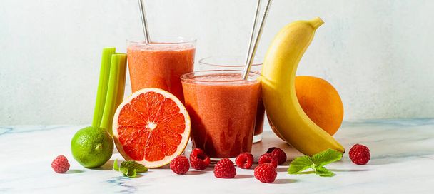 banner of fresh smoothie juice in glasses with metal tubes on the table and ingredients. healthly food - Foto, immagini