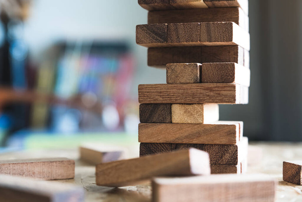 Closeup image of a Tumble tower wooden block game - Photo, Image