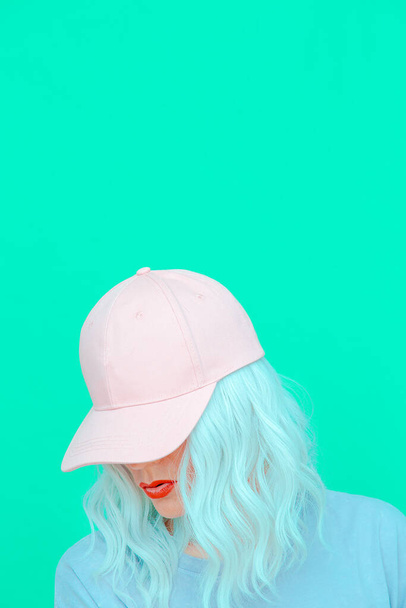 Girl 90s aesthetic. Urban style. Trendy Cap. Vanilla pastel monochrome summer mood - Fotó, kép