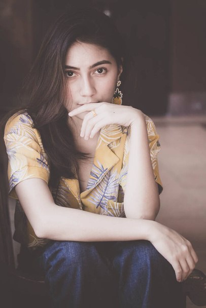 Portrait of thai yellow shirt adult beautiful girl relax time, in Vintage Style - Fotoğraf, Görsel