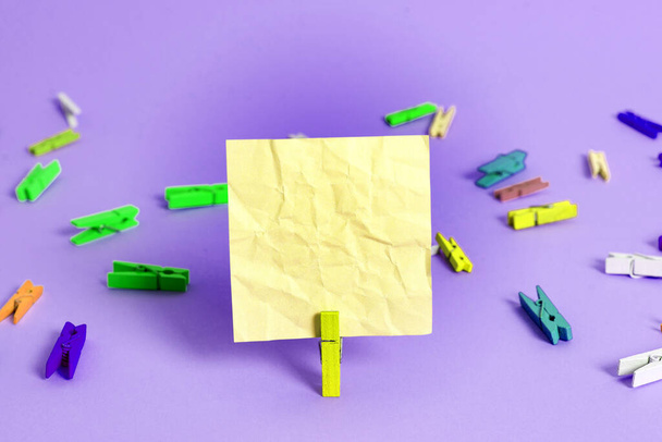 Rectangle Square Shaped Colored Paper With Clothespin Or Paper Ball In A Light Background. Colorful Crumpled Note Spread Around The Table. Office Supplies In A Desk. - Photo, Image