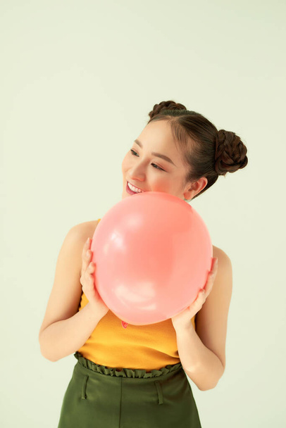 Portrait of nice cute lovable adorable attractive lovely cheerful cheery positive girl holding air baloon  - Фото, зображення