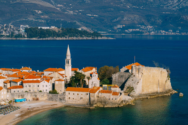 The old town of Budva, the blue sea and the mountains. - Photo, Image