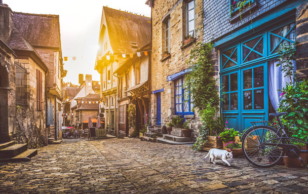 Old town in Europe at sunset with retro vintage Instagram style filter and lens flare effect - Photo, Image