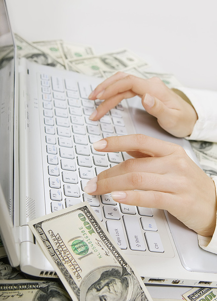Paid job: Female hands typing on white computer keyboard - Fotó, kép