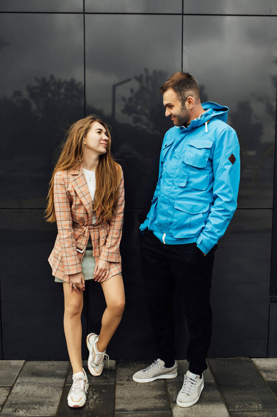 beautiful happy couple of lovers have fun in the city - 写真・画像