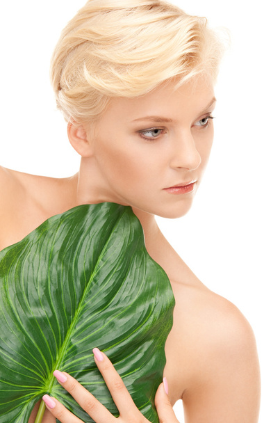 Woman with green leaf - Fotoğraf, Görsel