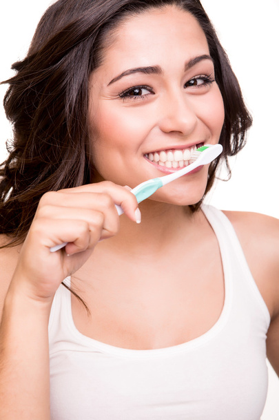 歯ブラシを保持している女性 - 写真・画像
