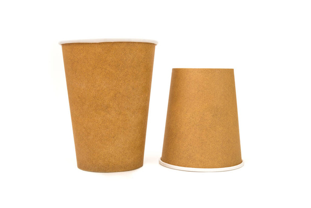 Hot drinking cup. White paper cup on a white background. - Photo, Image