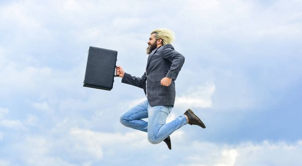 Happy worker. Freedom. Feeling free. Business man formal suit carries briefcase. Illegal deal business. Find your life mission. Businessman run away business case. Feel impact. Hipster hold briefcase - Foto, Imagen