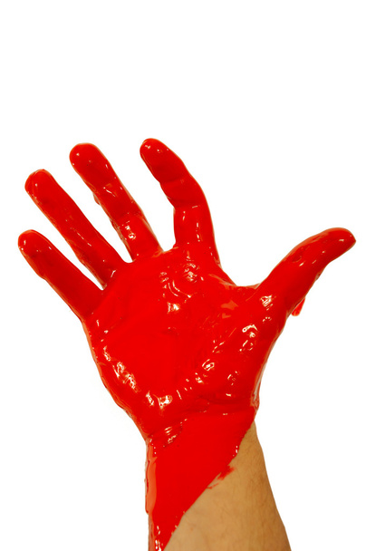 Red paint on hand - Photo, Image