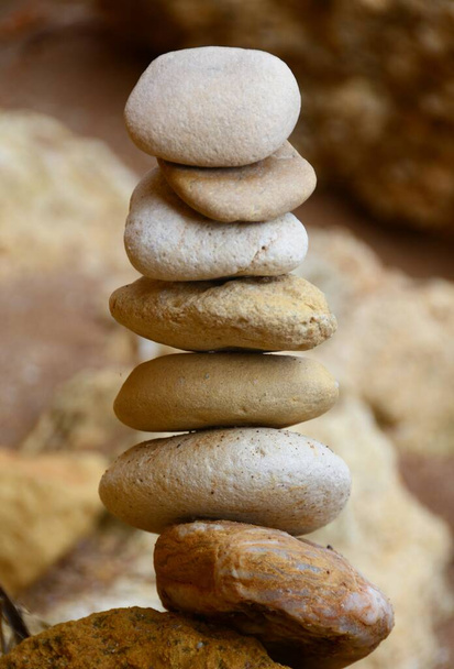 A vertical closeup shot of white pebbles stacked on each other - Foto, Imagen