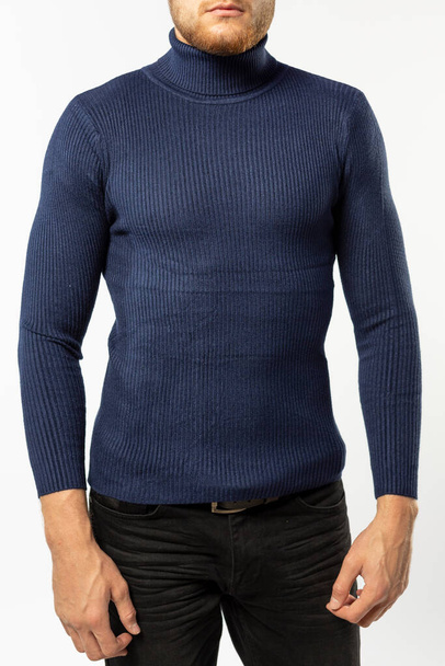 man in blue turtleneck with long sleeves on white background, mock-up, copy space - Foto, Imagen