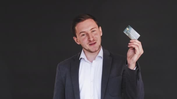 mobile banking cheerful business man credit card - Video, Çekim