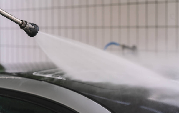 Car Washing. Cleaning Car Using High Pressure Water. - Valokuva, kuva