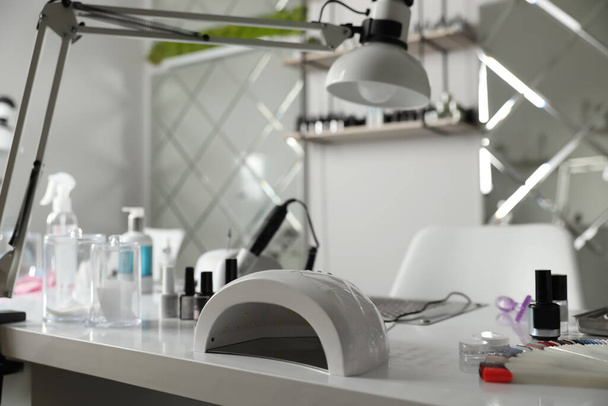 Professional equipment for manicure on table in beauty salon - Foto, Bild